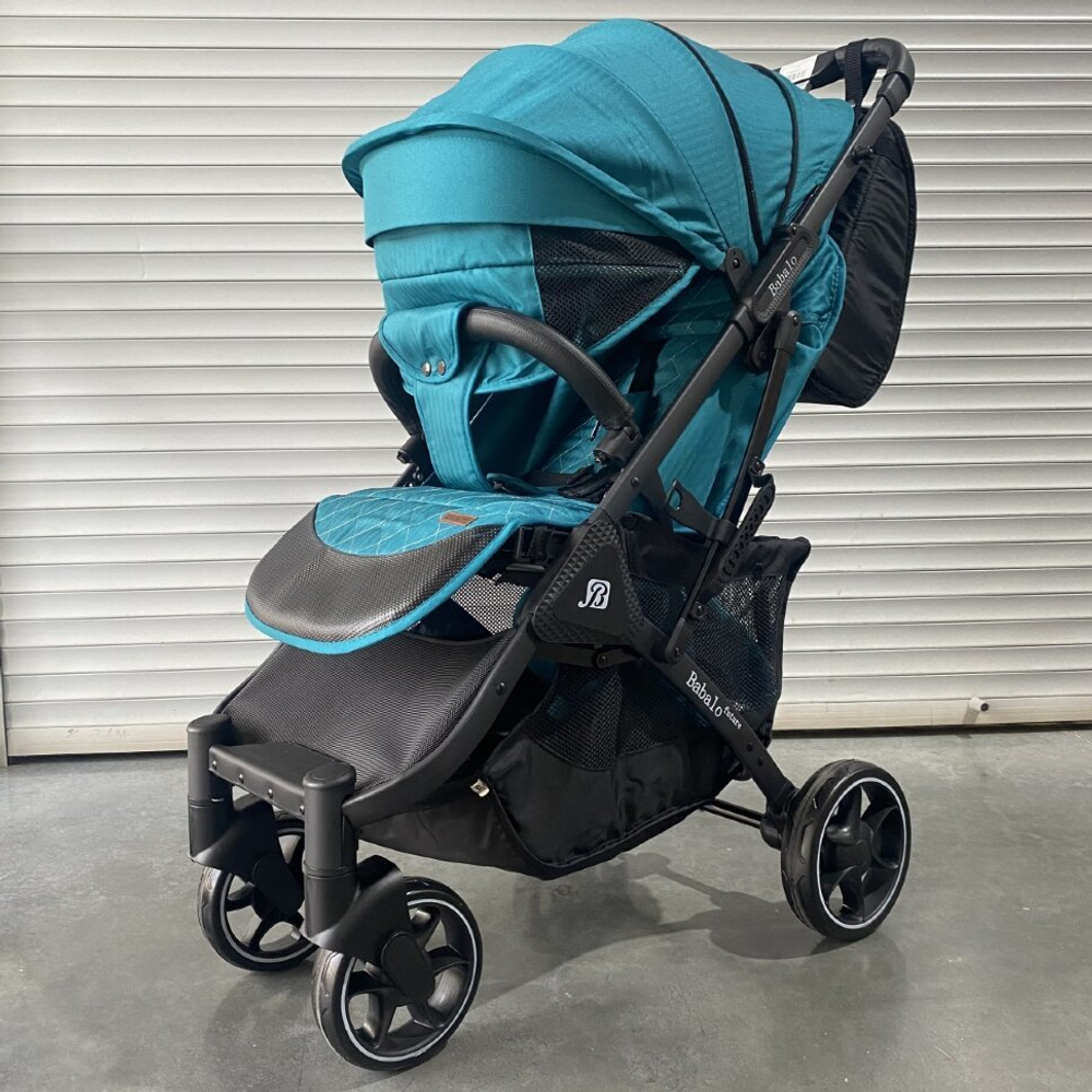 Прогулочная коляска BABALO J900 изумрудный текстиль на чёрной раме с сумкой на механической спинке
