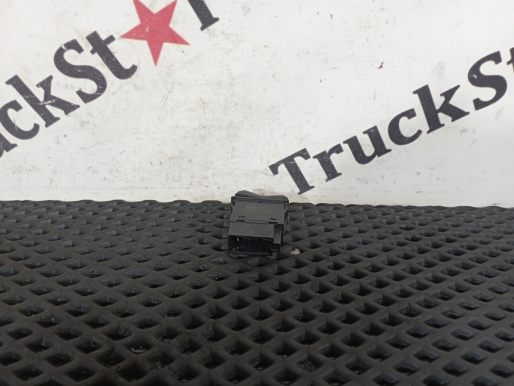 Кнопка системы ASR/ESC