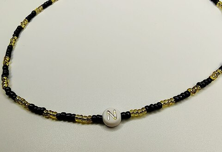 Чокеры с инициалом "N"