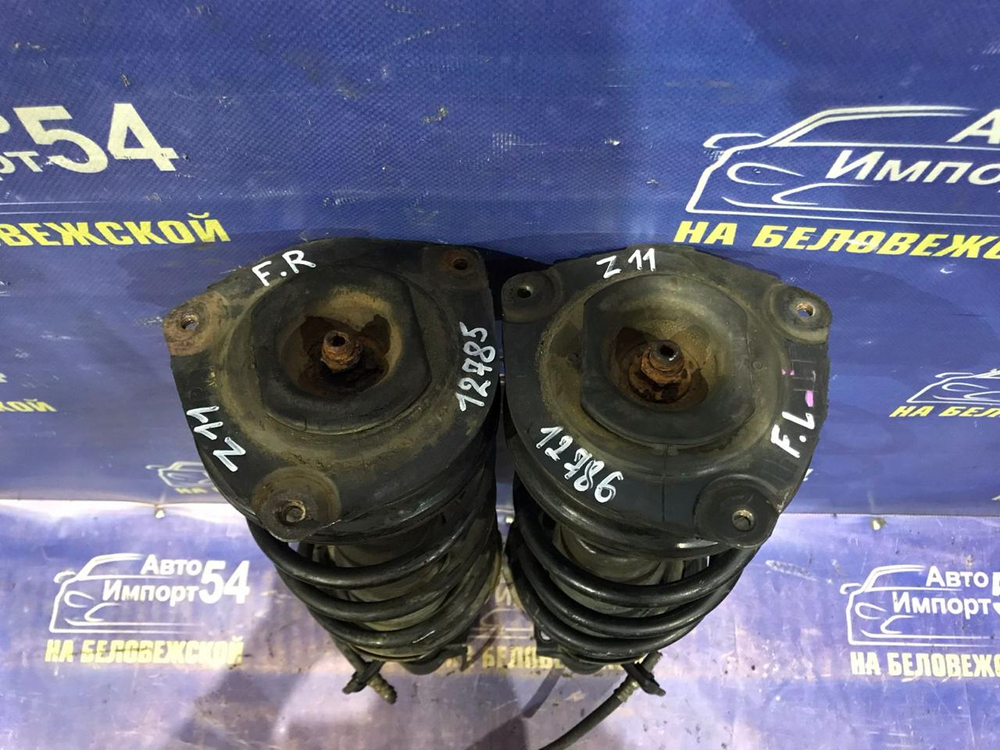 Стойка передняя левая NISSAN CUBE 2005-2008