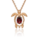 Подвеска «Черепаха» из красного золота с гранатом