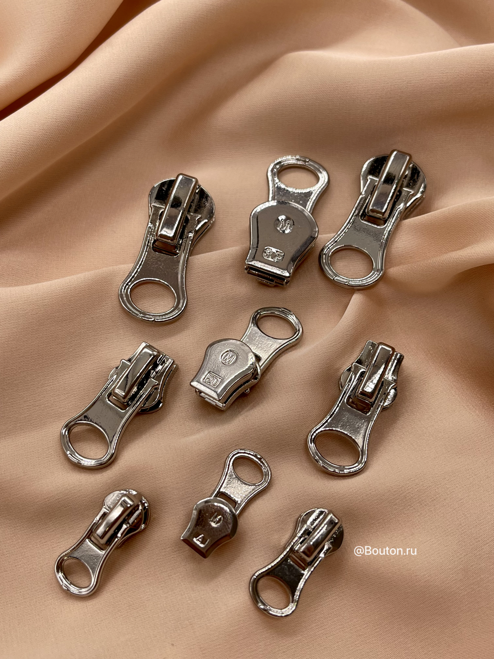 Собачка (бегунок) серебристая