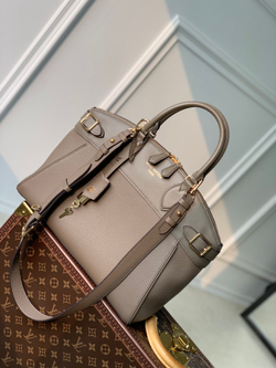 Louis Vuitton Lock It MM Bag