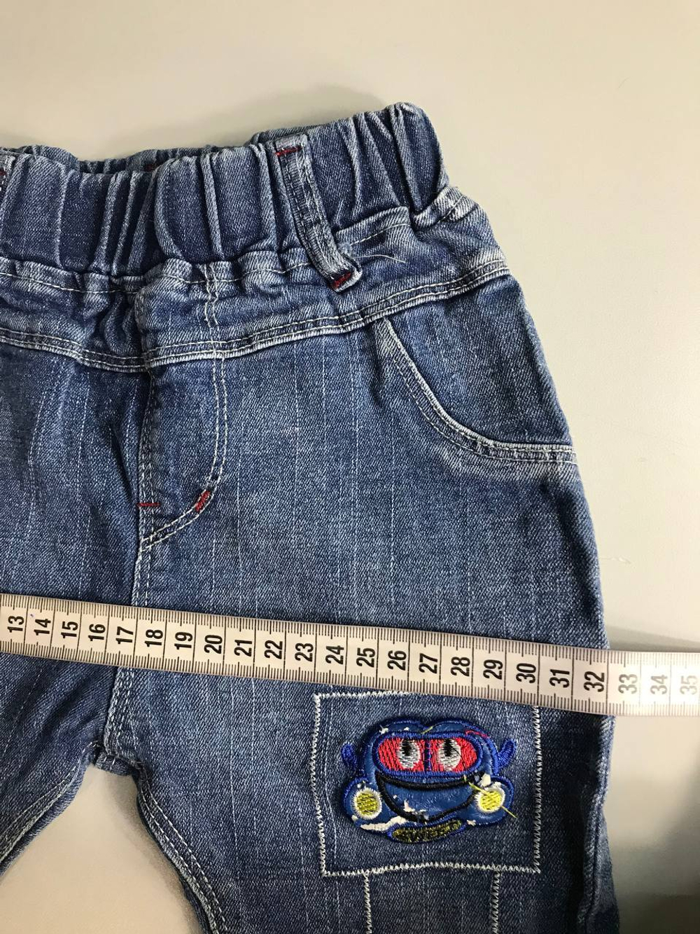 Джинсы с разноцветными отворотами на 2-3 года