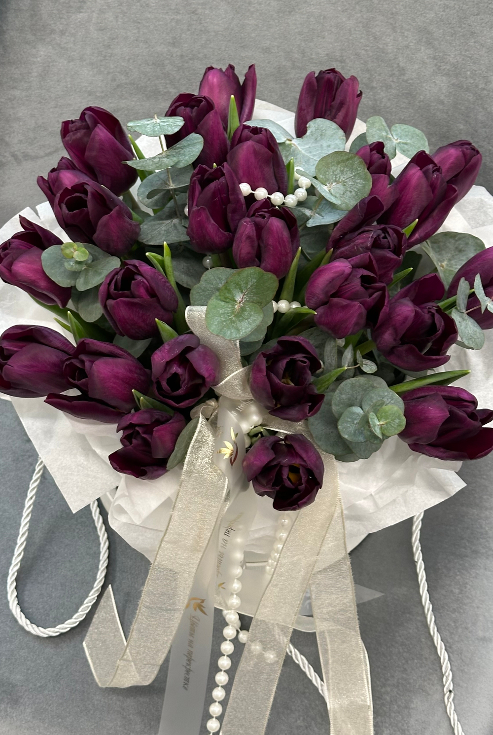 25 тюльпанов в круглой коробке