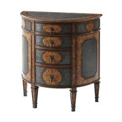 Комод с затейливой чеканкой