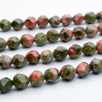 Унакит крупной огранки бусины, размер около 5,9-6,2 мм, цена за 27-28 шт (1/2 нити)