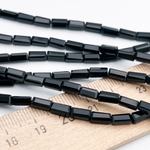 Бусина стекло, цвет черный, размер 6,5*3,5 мм, цена за 29-30 шт (1/2 нити)