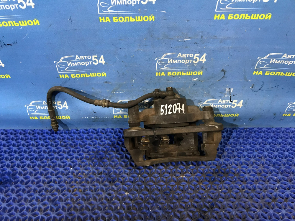 Суппорт тормозной передний левый MAZDA PREMACY 1999-2005