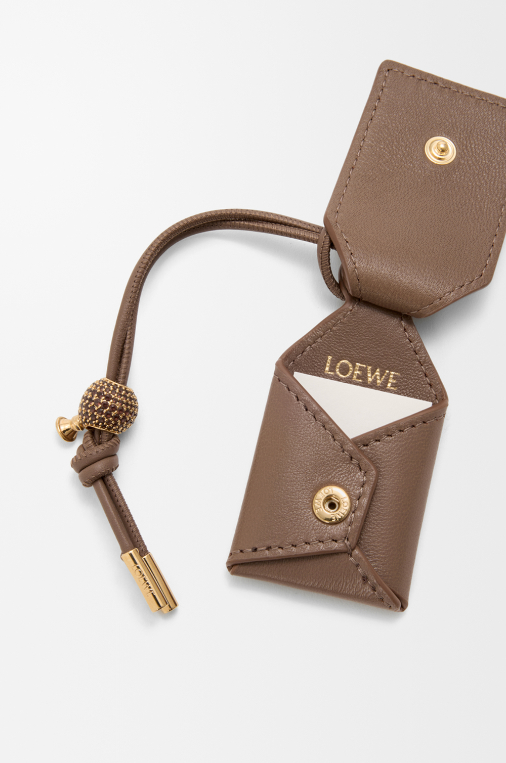 Loewe Мини-сумка Puzzle Featherlight из овечьей кожи наппа, серо-коричневый