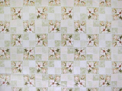 Клеенка столовая DEKORAMA 140см*20м "Лилии в зеленой клетке"