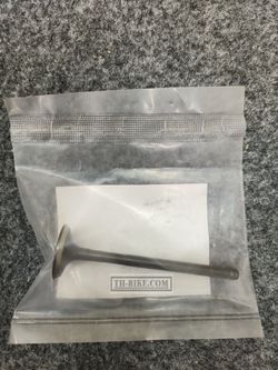 14721-KZY-700. VALVE, EX.