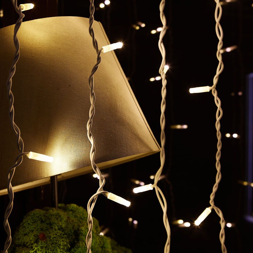 ULD-C2030-240-TWK WARM WHITE IP67 Занавес светодиодный с эффектом мерцания. 3х2м. Соединяемый. 240 светодиодов. Теплый белый свет. Провод белый. TM Uniel.