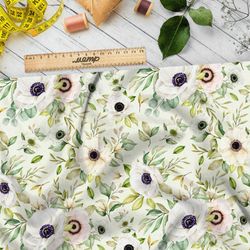 Ткань интерлок белые цветы на зеленом