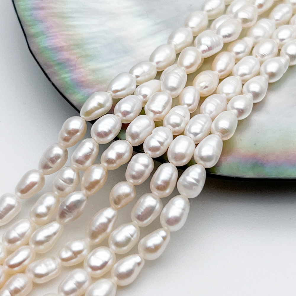 Жемчуг, размер около 5,2-5,5*3,8-4 мм, цена за отрезок 17 см (1/2 нити)