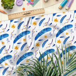 Ткань флис синие перья и жёлтые цветы на белом фоне