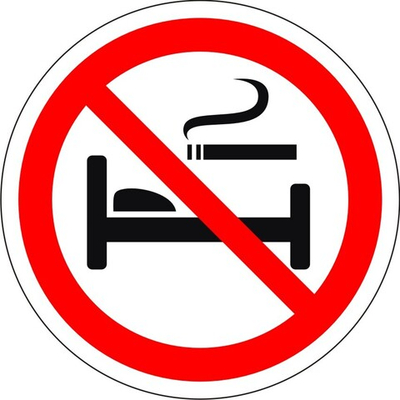 Знак "Курение в кровати запрещено"