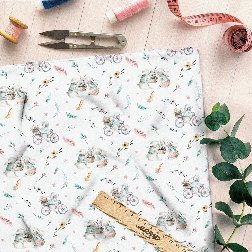 Ткань интерлок зайки на велосипеде