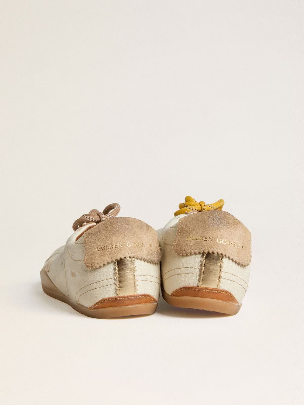 True Star in white nappa leather with gold star and beige suede heel tab