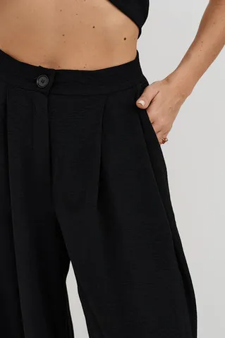 Брюки палаццо свободного кроя черного цвета