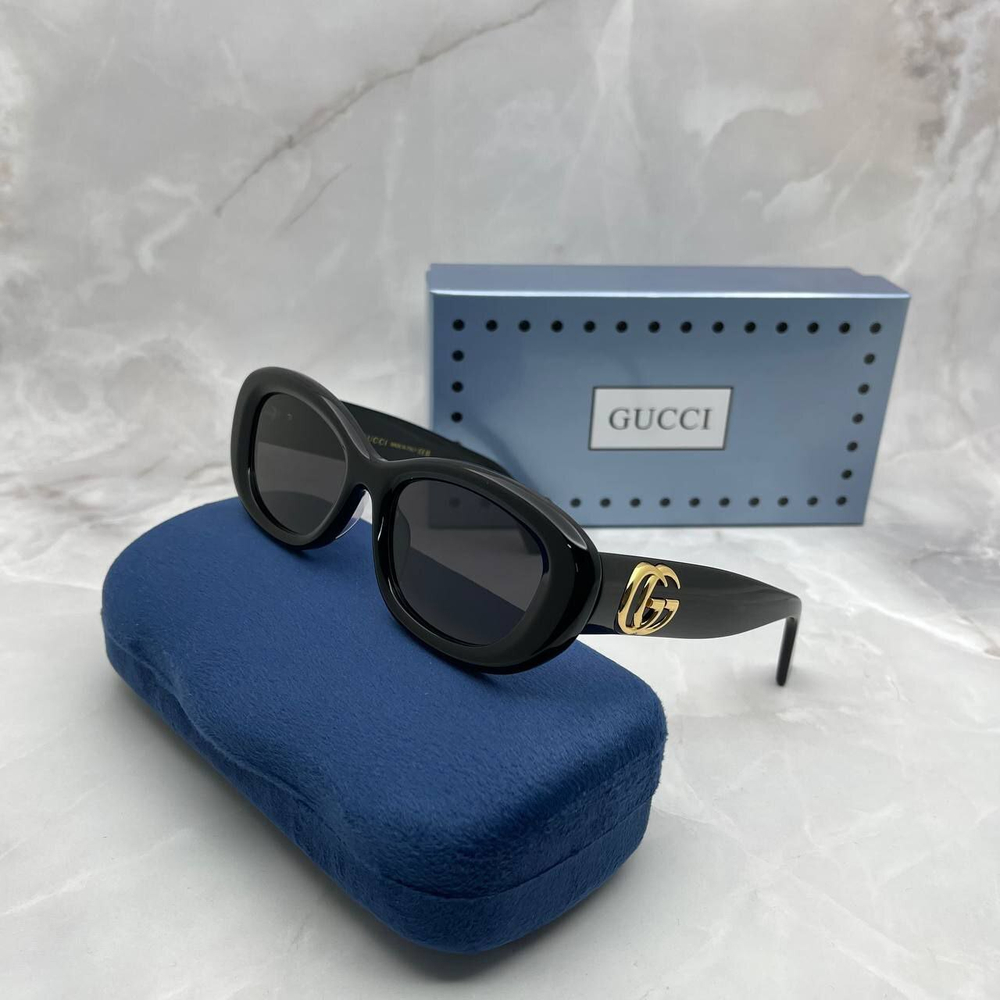Солнцезащитные очки Gucci