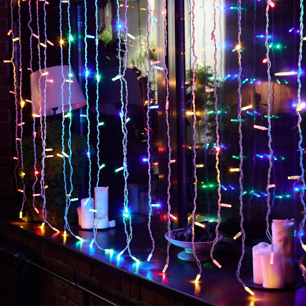 ULD-C2030-240-TWK MULTI IP67 Занавес светодиодный с эффектом мерцания. 3х2м. Соединяемый. 240 светодиодов. Разноцветный свет. Провод белый. TM Uniel.