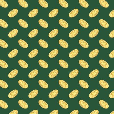 Золотые монеты на зеленом