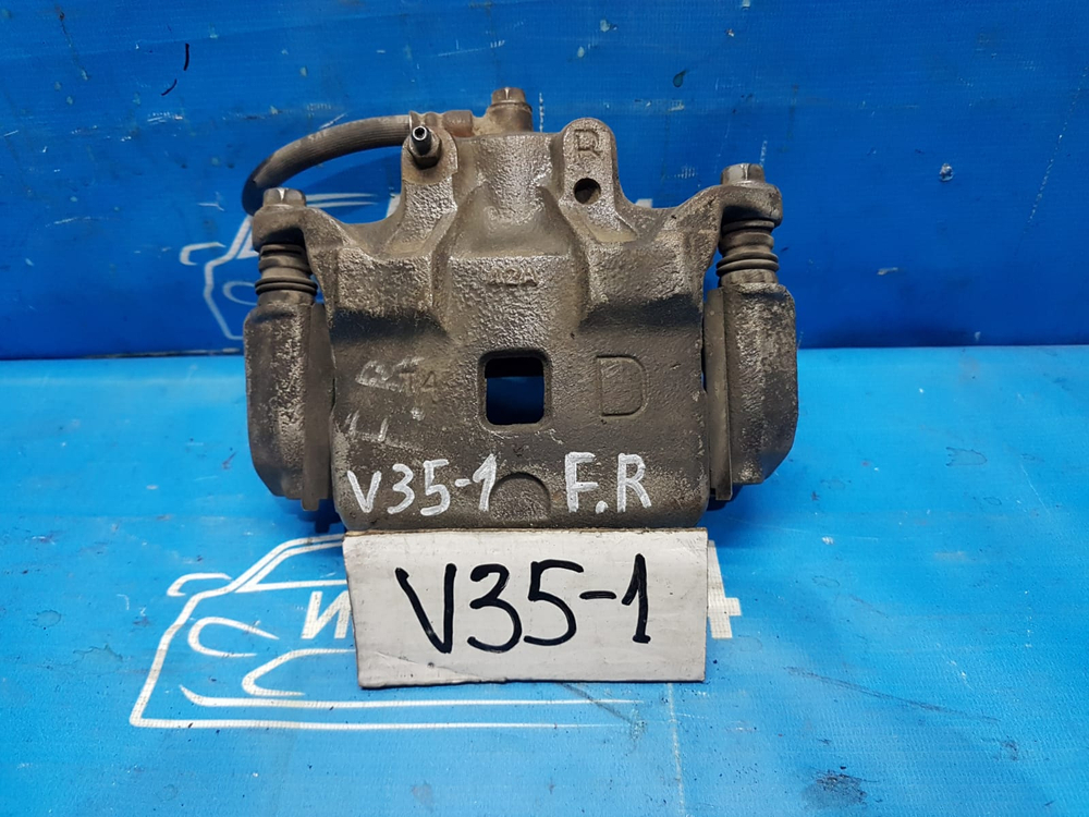 Суппорт тормозной передний правый NISSAN SKYLINE 2004