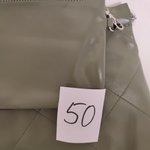 STELLA mini оливковая - небольшие вмятины на сумке, следы от цепочки на маленькой сумочке 50