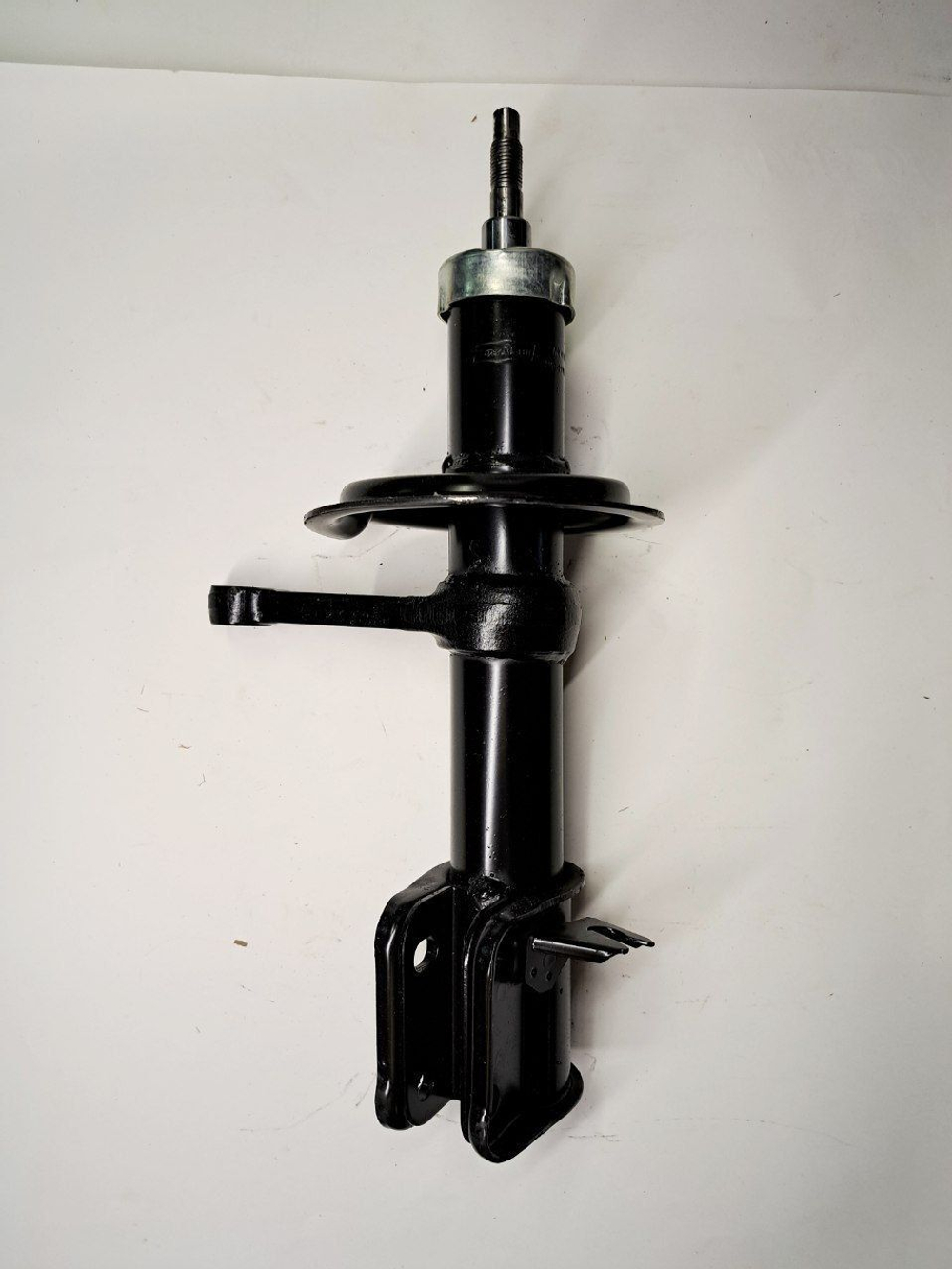 Стойка амортизатора передняя правая 1119-2905402 Птимаш