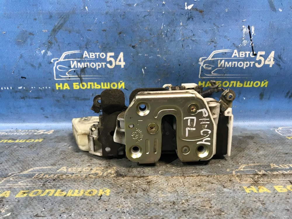 Замок двери передней левой NISSAN PRIMERA 1999