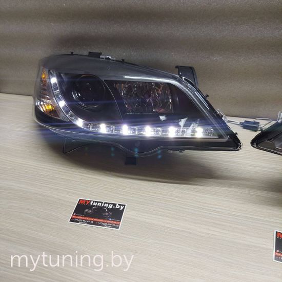 Передние фары Opel Astra G daylight black