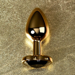 Золотистая коническая анальная пробка 7см с черным кристаллом сердечком ToyFa Metal 717016-135