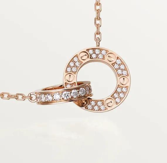 Колье Cartier Interlocking Love