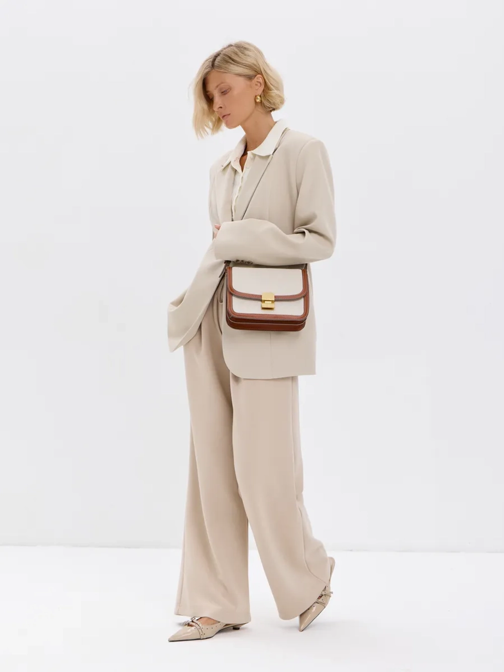 Широкие демисезонные брюки-палаццо со складками