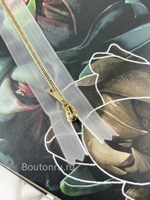 Молния на прозрачной сетке золотистая