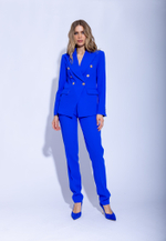 Женский синий элегантный костюм с двубортным жакетом