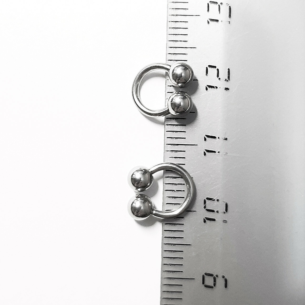 Подковы, полукольца для пирсинга: диаметр 6 мм, толщина 1.2 мм, диаметр шариков 4 мм. Сталь 316L. 1 шт