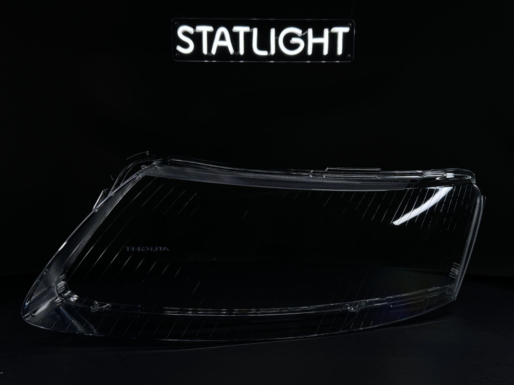 Левое стекло фары AUDI A6 С6 2004-2011