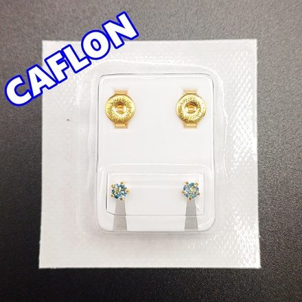 Серьги-гвоздики для прокола ушей под пистолет. CAFLON (Англия). Золотистые со светло-голубыми кристаллами, крапление
