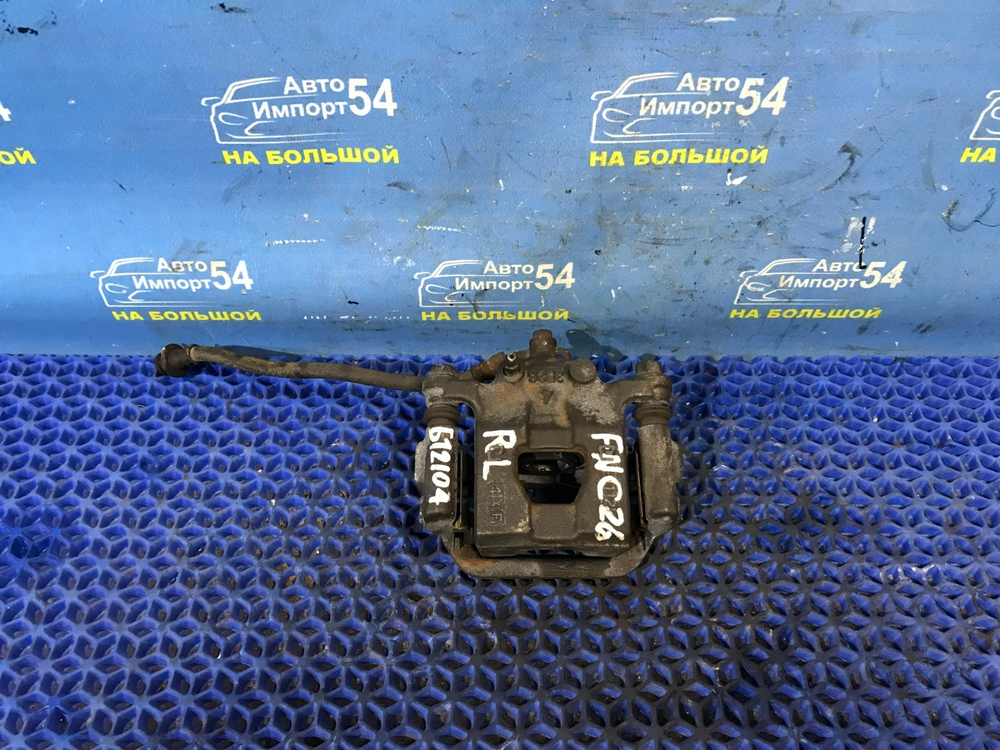 Суппорт тормозной задний левый NISSAN SERENA 2010-2016