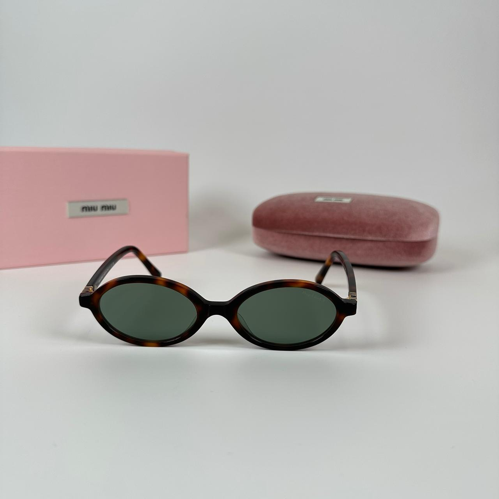 Солнцезащитные очки Miu Miu