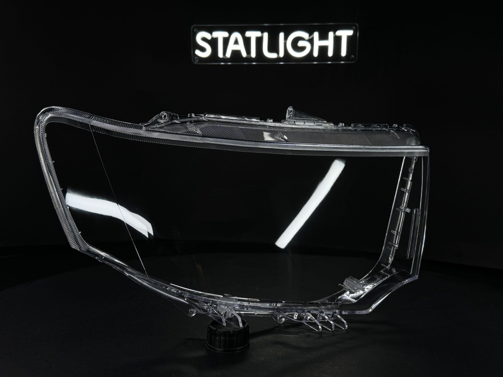 Правое стекло фары Mitsubishi Pajero Sport 2008-2016