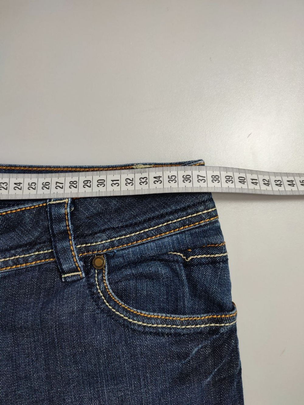 Джинсы темно-синие 42 размер