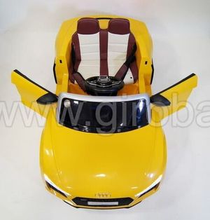 Детский электромобиль River Toys AUDI R8 желтый фото №2