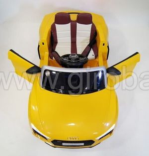 Детский электромобиль River Toys AUDI R8 желтый