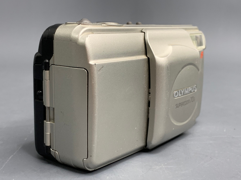 Olympus SuperZoom 70G с царапиной на линзе