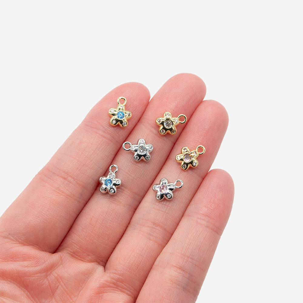 Подвеска "Цветочек" 9,5*7,5мм, голубые и прозрачные фианиты, позолота