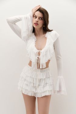 Блуза с оборками кремового цвета