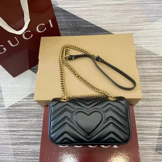 Стеганая мини-сумка Gucci GG Marmont черный